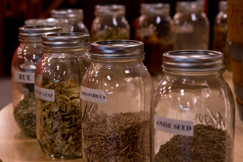 The education you get on Greenbar's approach is somewhat hands-on; take time to check out the jars of herbs and other aromatics that go into their products.