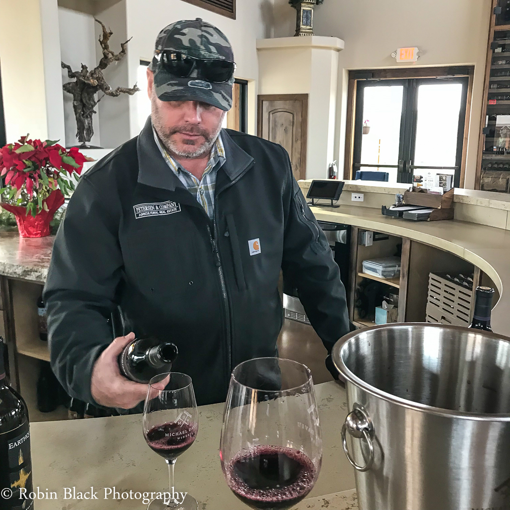 Kevin Phillips pours some of his family's wines during a discussion of Lodi's ancient vines.